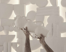 cycladic forms and traditions shape cavernous tserki patisserie in paros