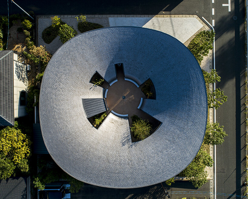 NKS2 architects crowns 'sky vessel house' with inward-curved