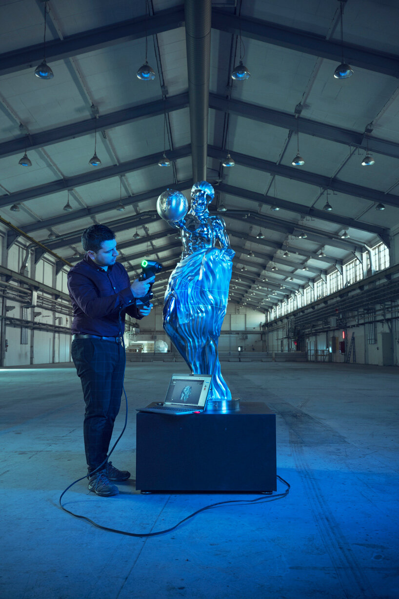 real-life impossible statue revives michelangelo and rodin's signature styles with AI