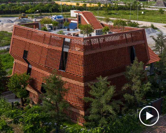 H&P architects' latest clay tile structure unfolds as a nature-infused dwelling in vietnam