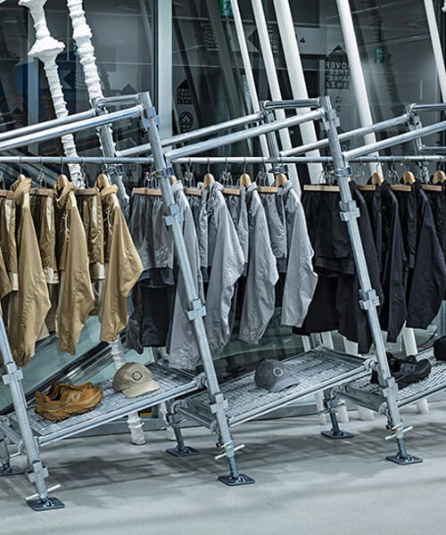 sloped scaffolding displays in tokyo showcase inclusive apparel range by new balance