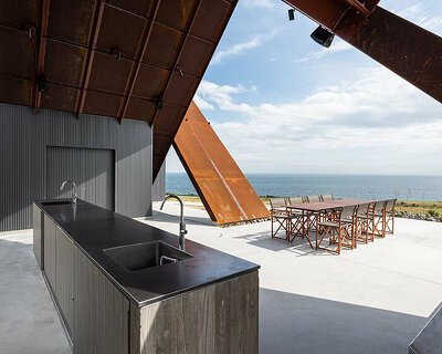 ensemble of pitched steel volumes shape OHArchitecture's bbq terrace in awaji, japan