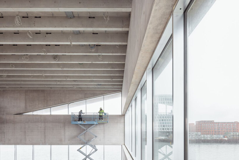 sneak peek into BIG/bjarke ingels' new HQ in copenhagen, set for completion this fall