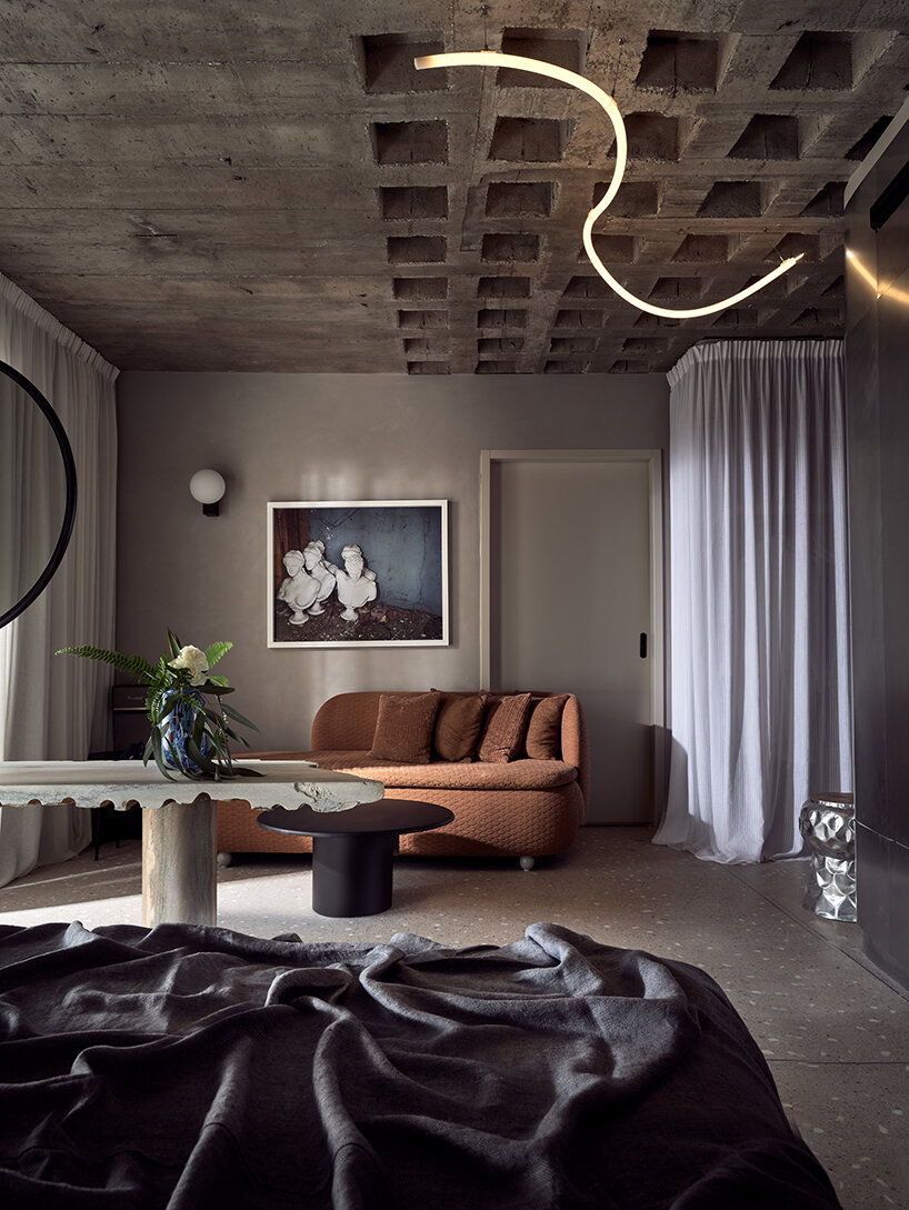 handcrafted, cave-like surfaces engulf ekies all senses resort's redesigned suites in greece