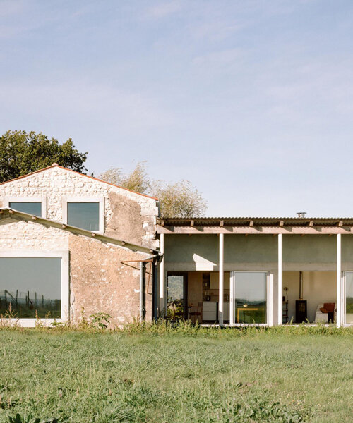old and new textures interplay in the extension of renovated old farm in france