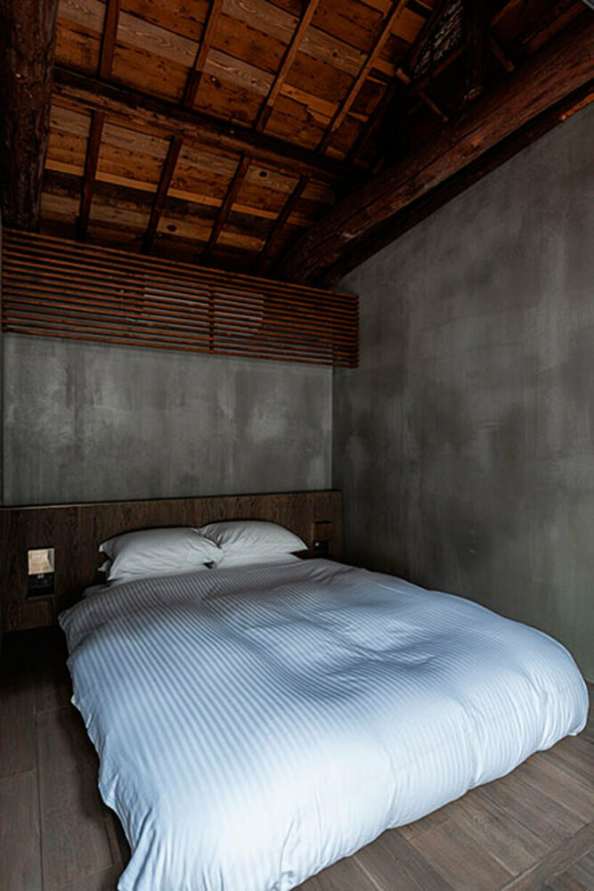 minimal hotel renovation breathes new life into old wooden townhouse in kyoto