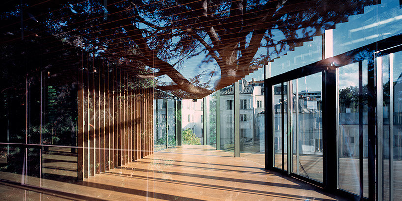 explore kengo kuma's wooden architecture through the lens of erieta attali