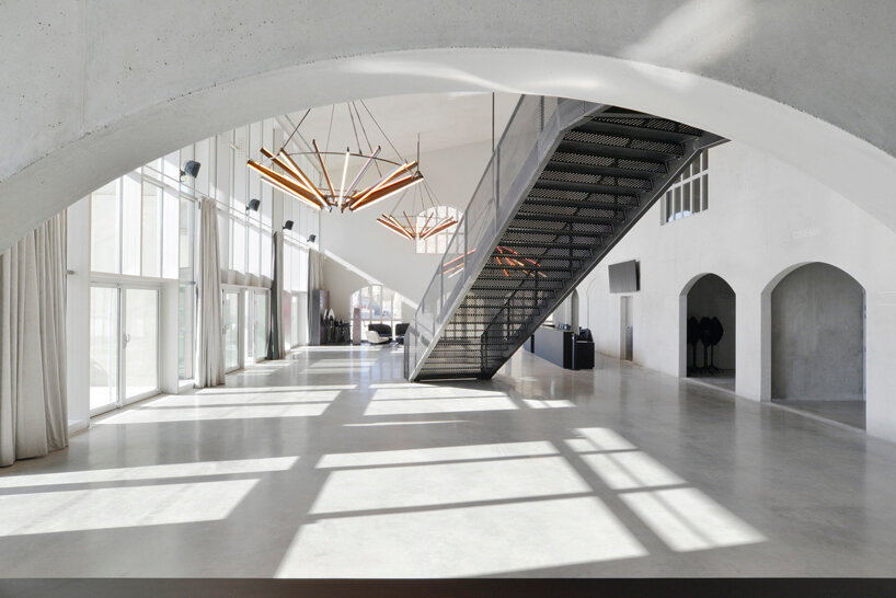 hybrid cultural center by K architectures opens dramatic concrete arcades in france