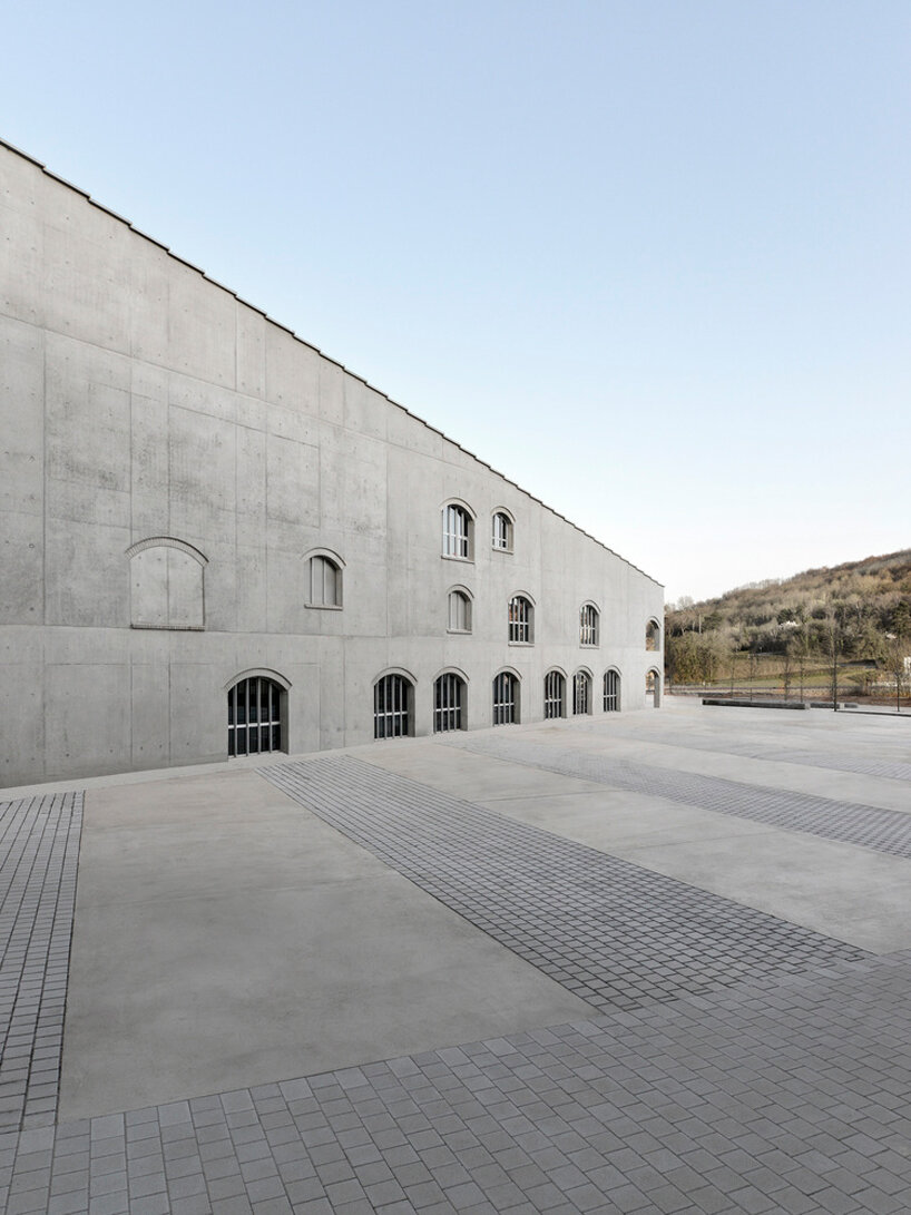 hybrid cultural center by K architectures opens dramatic concrete arcades in france