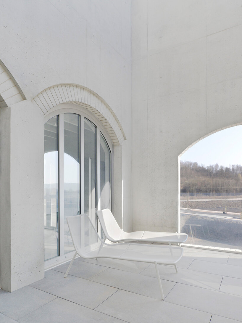 hybrid cultural center by K architectures opens dramatic concrete arcades in france