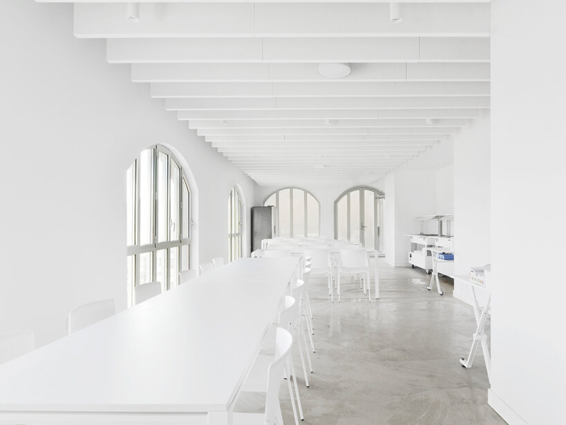 hybrid cultural center by K architectures opens dramatic concrete arcades in france