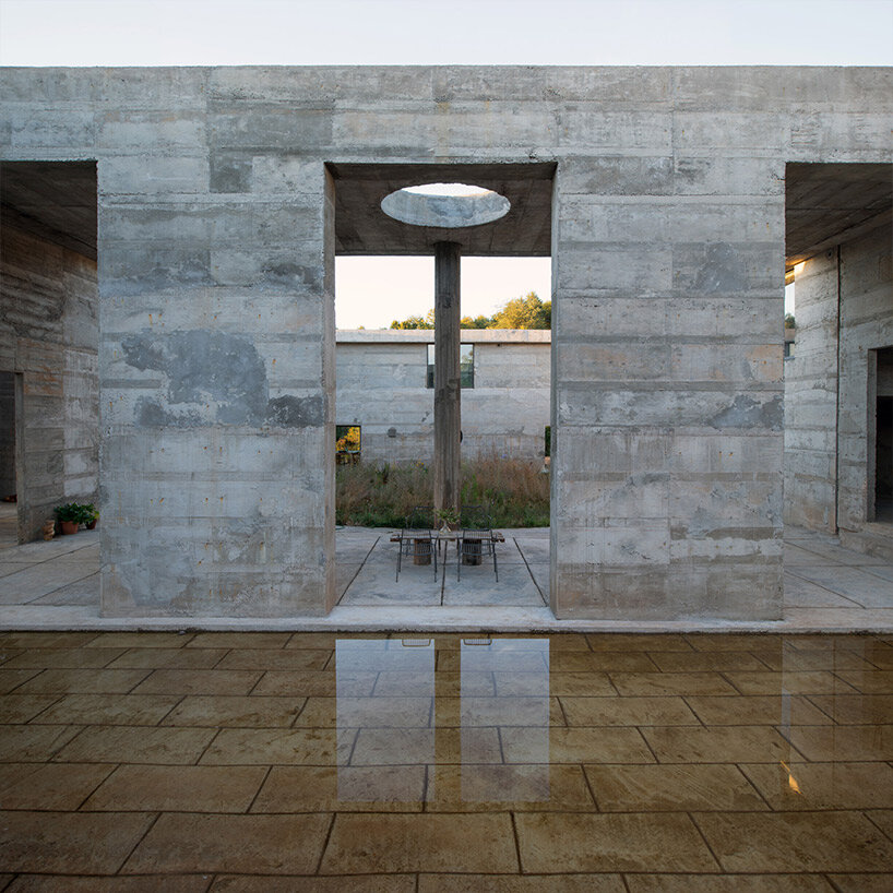 geometric cut-outs puncture pezo von ellrichshausen's fortress-like luna house in chile