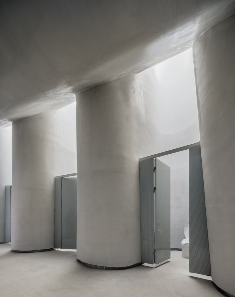 PAO's public restroom meanders around amoeba-shaped concrete structure in beijing