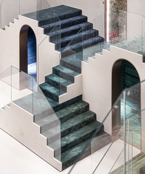 roar designs a captivating display of recurring stairs for jaipur rugs' showroom in dubai