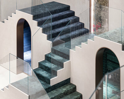 roar designs a captivating display of recurring stairs for jaipur rugs' showroom in dubai
