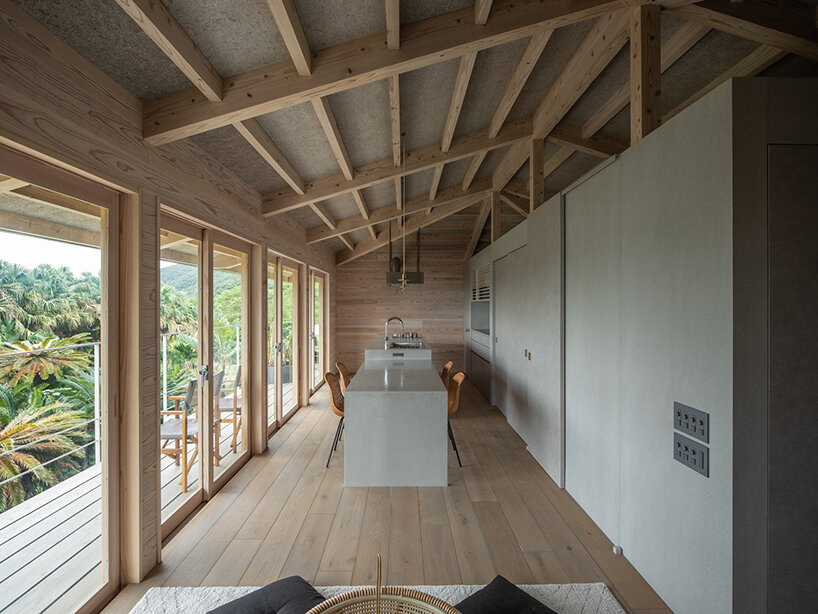 on a secluded japanese hill, ryosuke ono nestles a stilted rental villa with a panoramic porch