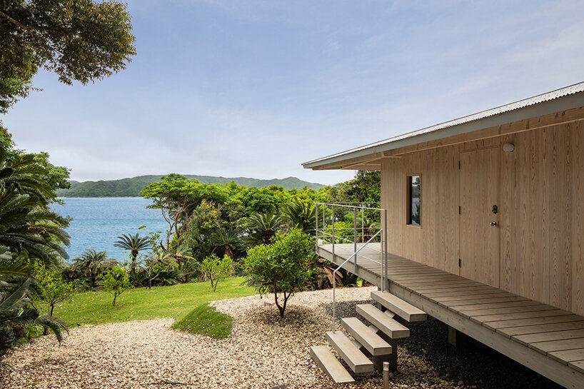 on a secluded japanese hill, ryosuke ono nestles a stilted rental villa with a panoramic porch