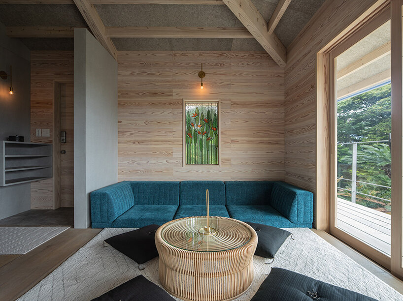 on a secluded japanese hill, ryosuke ono nestles a stilted rental villa with a panoramic porch