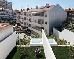 lioz arquitetura revives historic homes in portugal with contemporary interventions