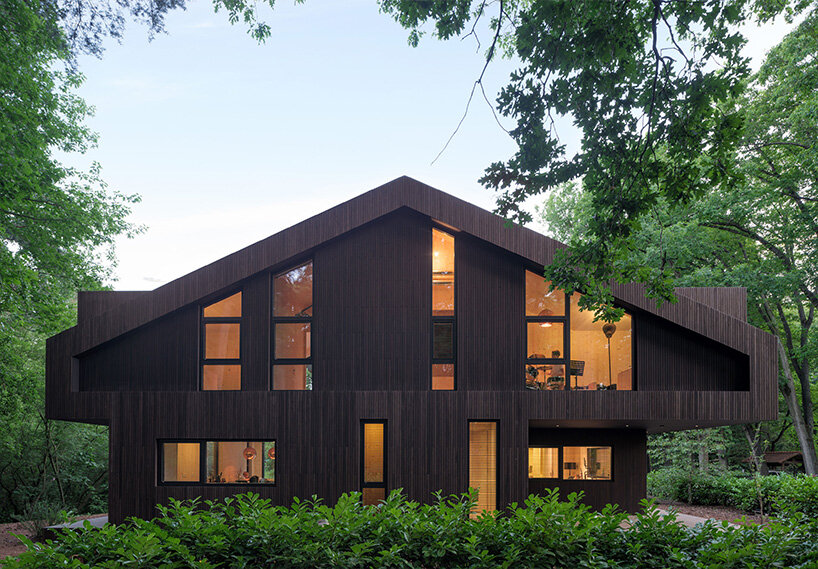 protruding windows bring nature within spee architecten's sustainable house in holland