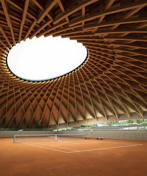 domed timber rooftop by victor ortiz encloses brazil's largest private tennis court