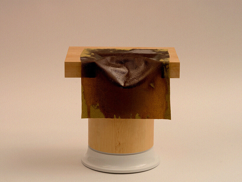 caleb engstrom drapes resin-coated wool over furniture to explore textile in 'wettest' form