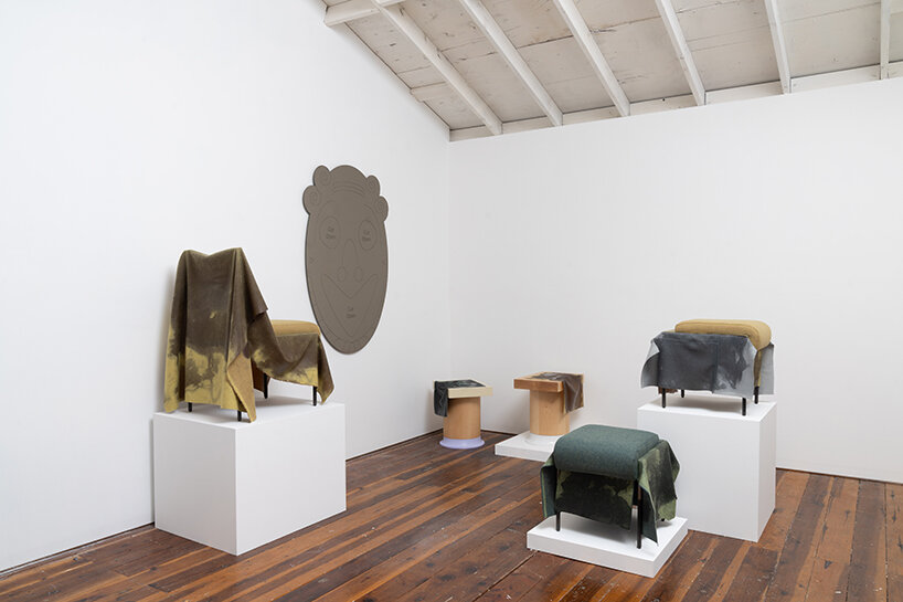 caleb engstrom drapes resin-coated wool over furniture to explore textile in 'wettest' form