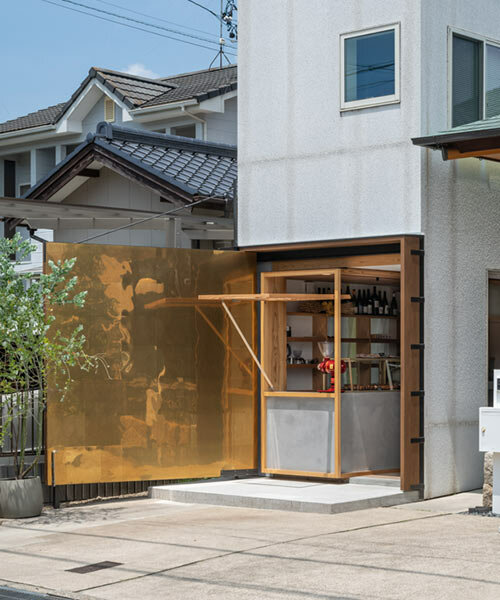 maki yoshimura wedges tiny box-like bakery shop between two houses in japan