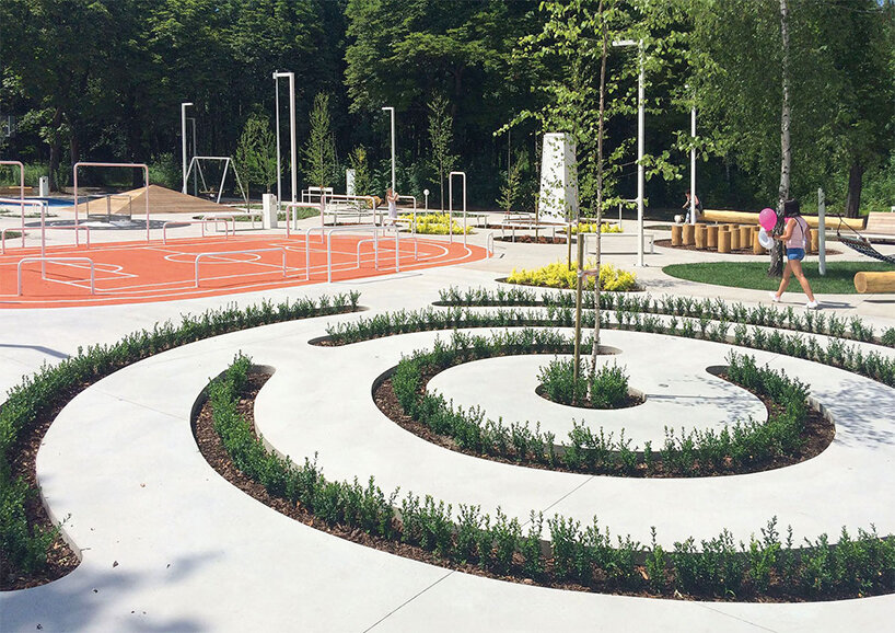 SLAS architekci's public park in poland is a collage of playful, green-filled shapes