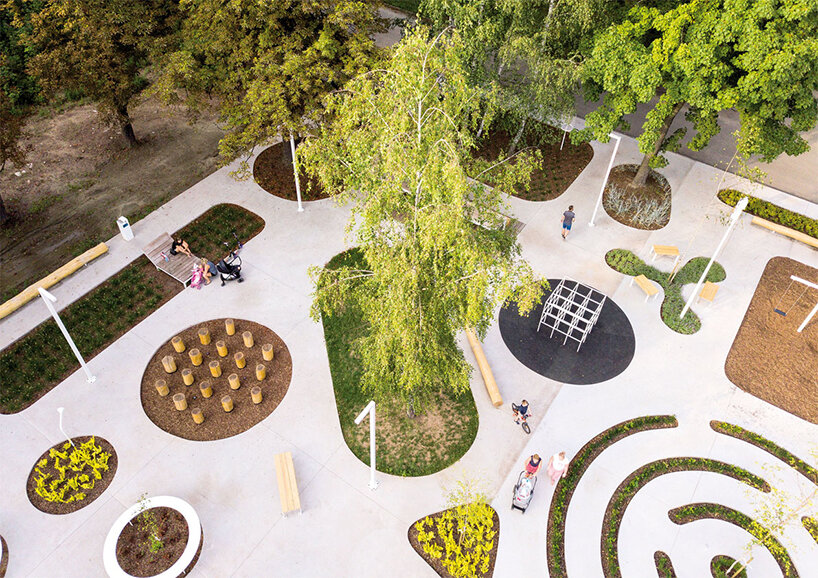SLAS architekci's public park in poland is a collage of playful, green-filled shapes