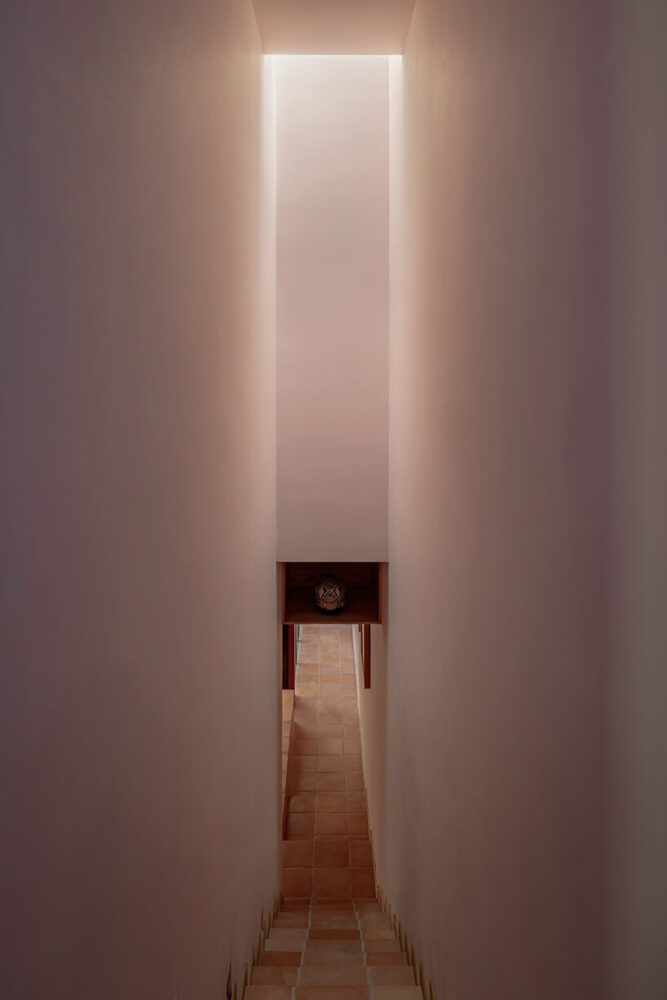 all-red casa ederlezi pairs bold volumetry with mediterranean tones