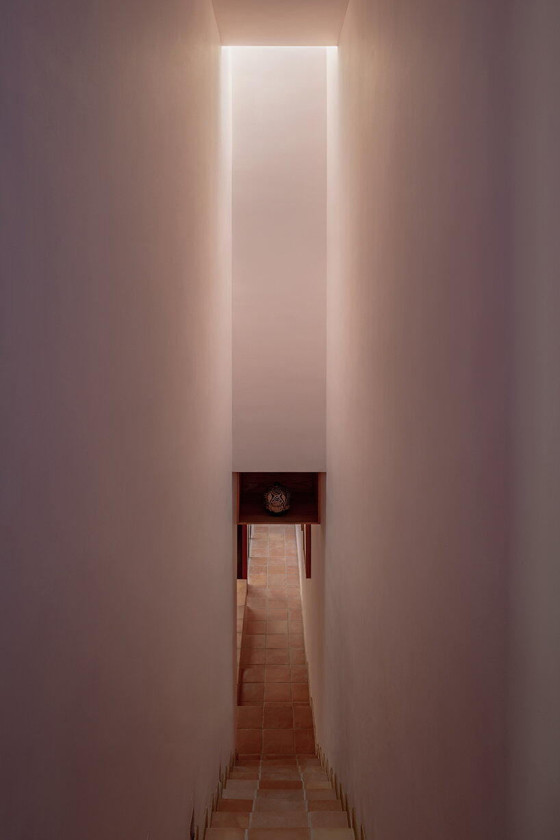 all-red casa ederlezi in mexico pairs bold volumetry with mediterranean tones