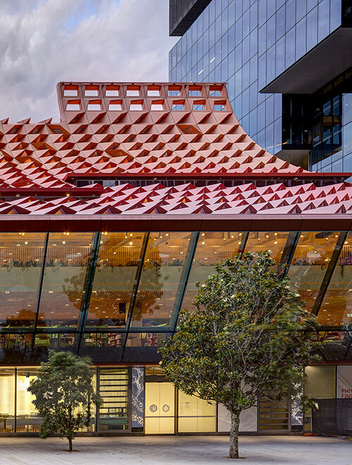 manuelle gautrand's tessellated roof drapes over phive civic center in parramatta, sydney