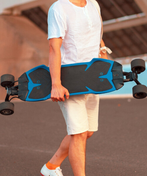 electric skateboard 'traqpod 3' with retractable wheels flips into longboard for land surfing