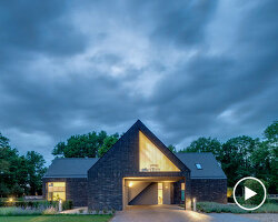 four gabled volumes outline cross-plan residential layout in the netherlands