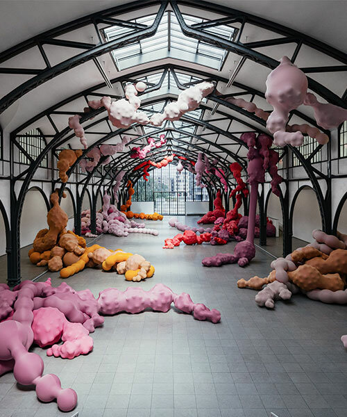 inflated organ sculptures by eva fàbregas grow out of metal beams at hamburger bahnhof