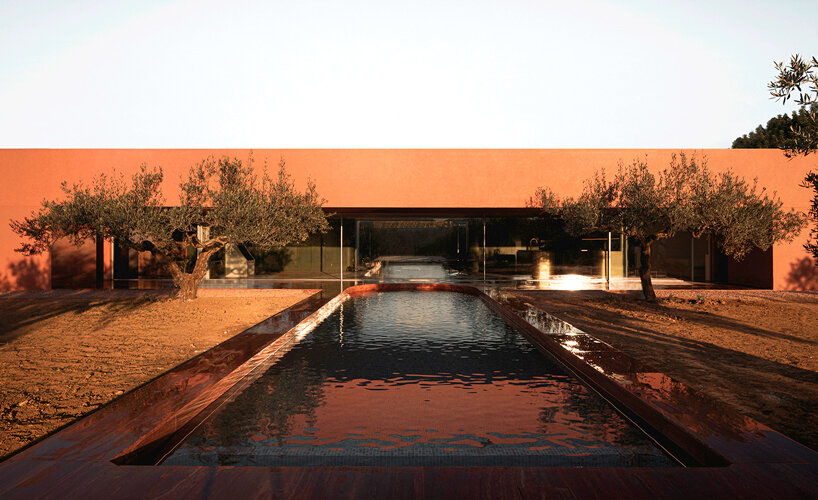 balzar arquitectos plants valencian residence's red steel volume in an olive grove