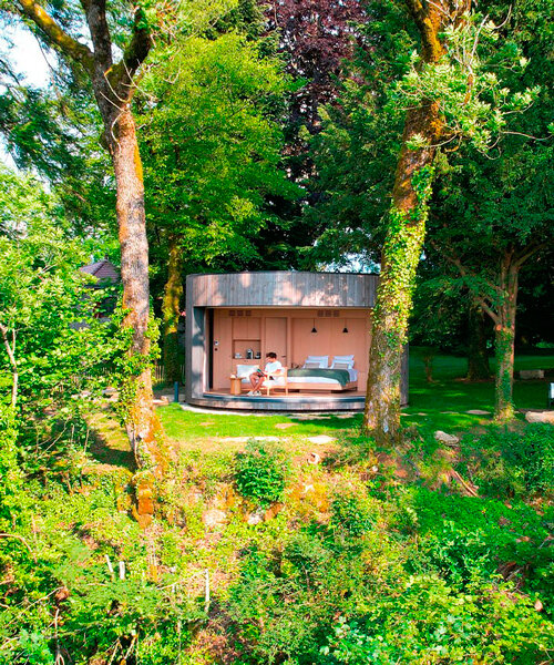 lumipod 6 takes shape as rounded wooden hotel cabin in the french countryside