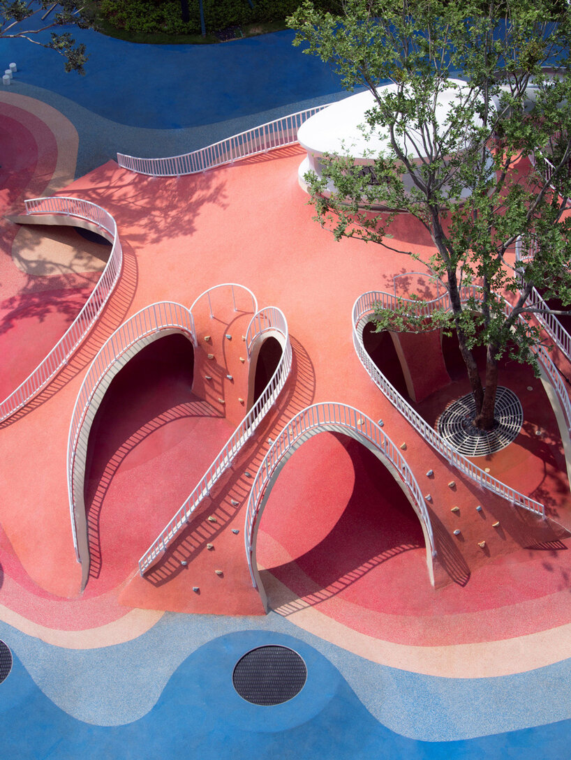 red dunes playtopia in china embraces undulating landscape for children's activities