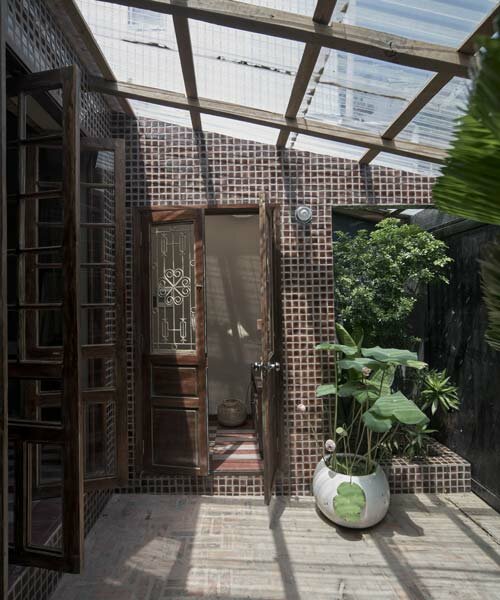 limdim studio brings modern design to vietnamese alley house with ngâu restoration
