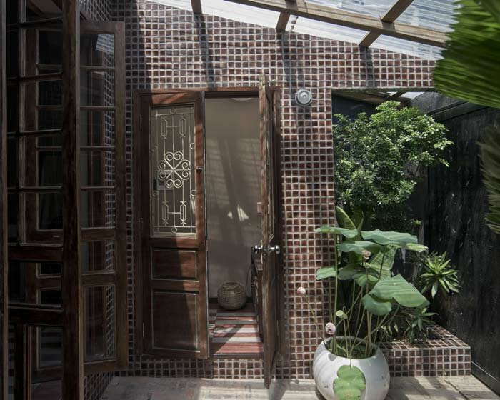limdim studio brings modern design to vietnamese alley house with ngâu restoration