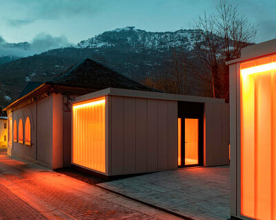 haro museum's translucent openings illuminate the square of val d'aran in spain
