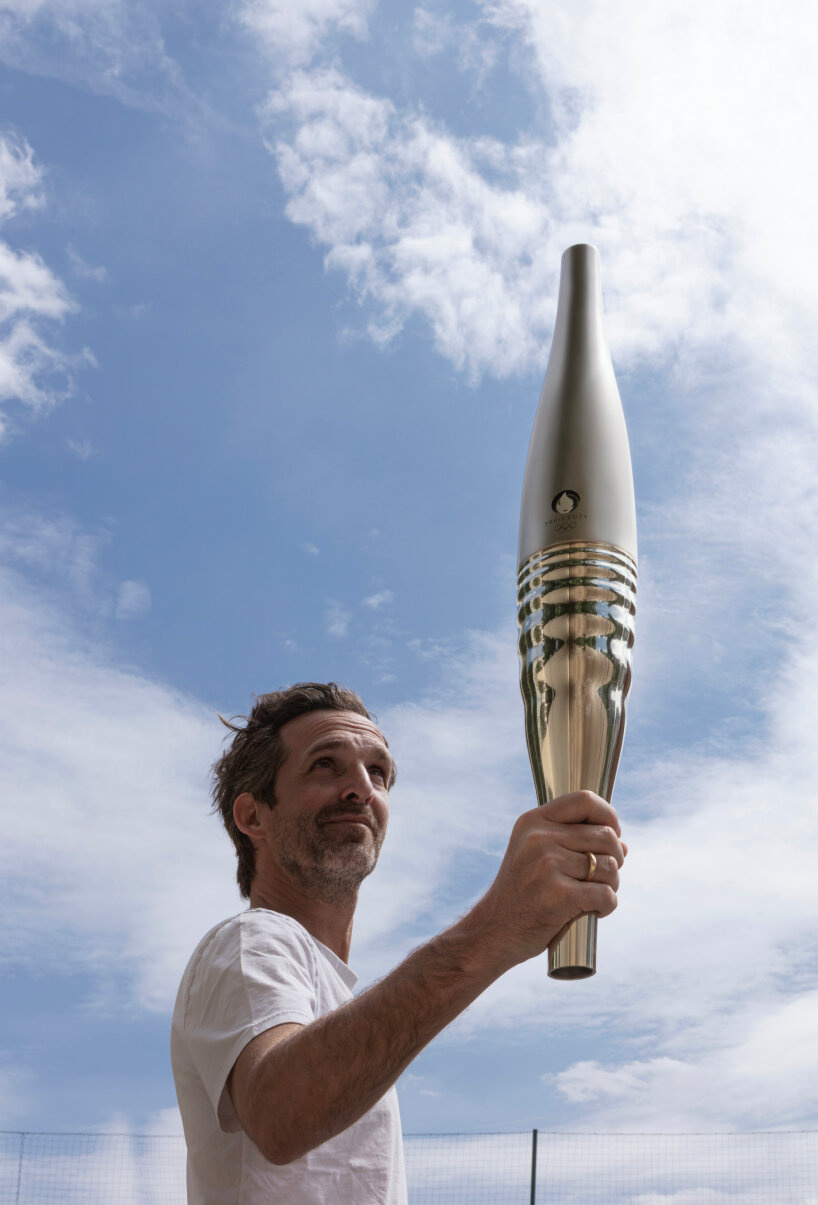 mathieu lehanneur unveils paris 2024 torch as batlike steel that