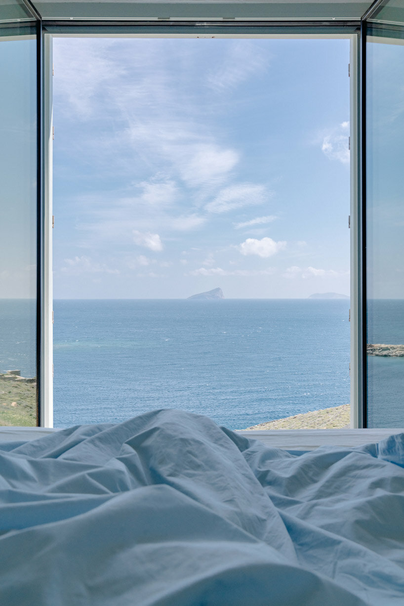 sigurd larsen sculpts interconnected cubes for single house on rocky greek island