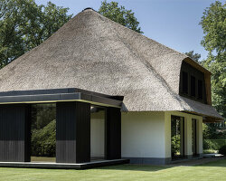 belgian thatched-roof house gets a sleek pavilion extension by mieke van herck architects