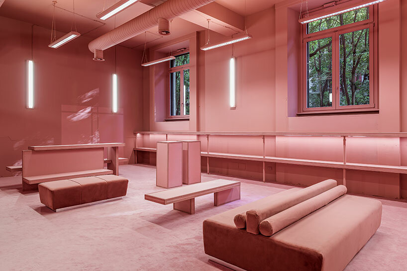 vibrant shades of pink clad paris texas showroom by studioboom in milan