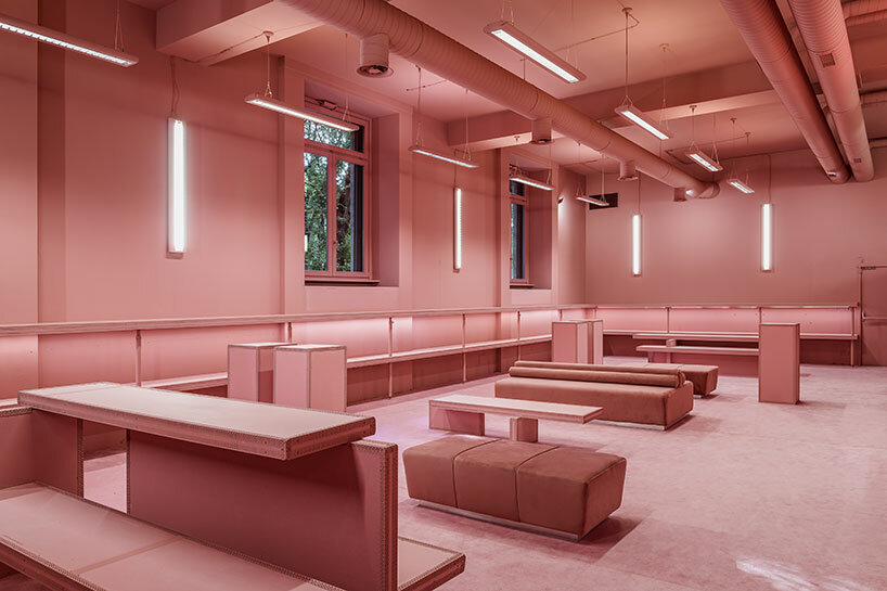 vibrant shades of pink clad paris texas showroom by studioboom in milan