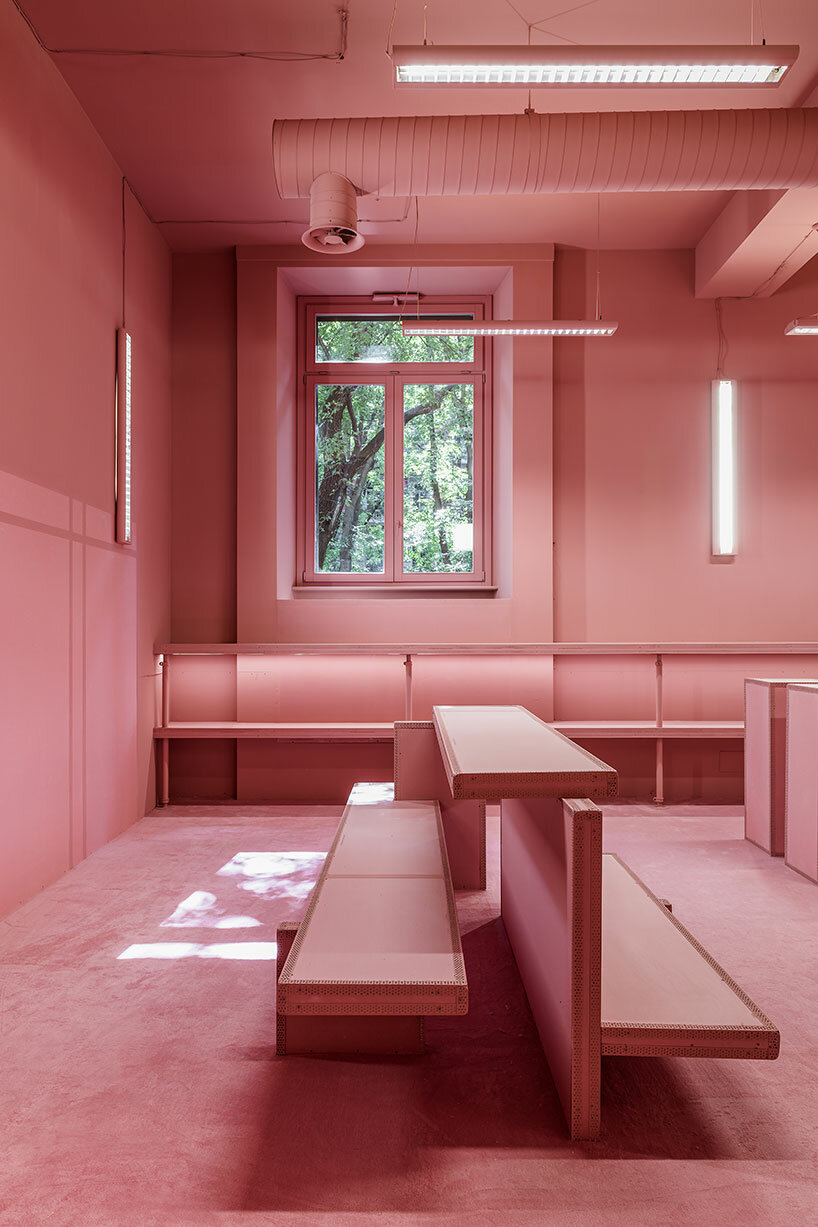 vibrant shades of pink clad paris texas showroom by studioboom in milan