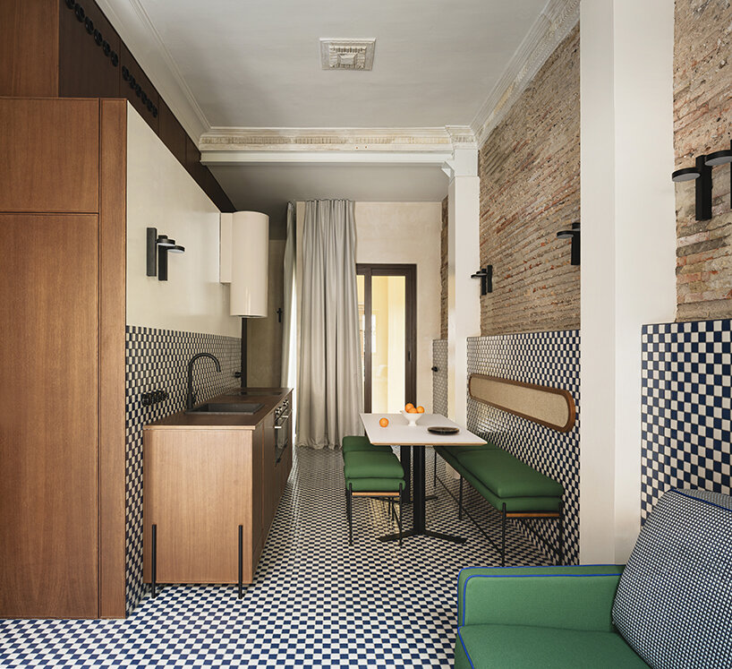 viruta lab uplifts 1940s valencian house with a 'sea' of checkered surfaces