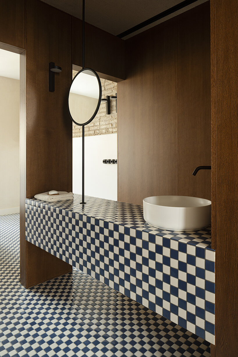 viruta lab uplifts 1940s valencian house with a 'sea' of checkered surfaces